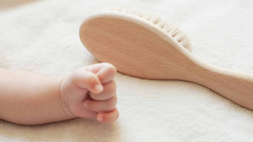 Baby with Baby Brush