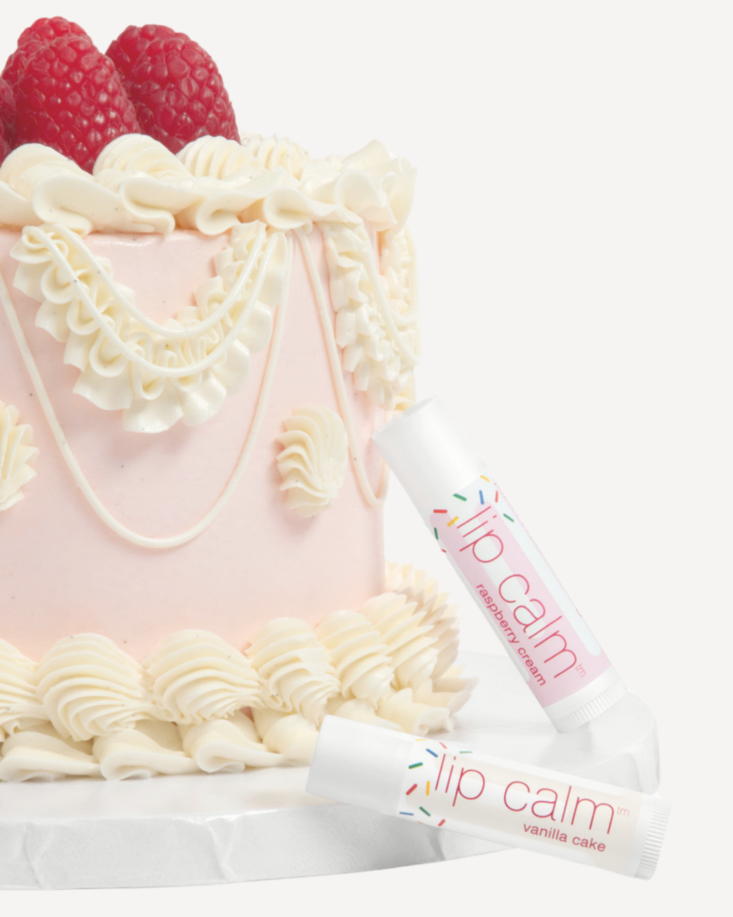 Raspberry Cream Lip Calm & Vanilla Cake Lip Calm on Cake